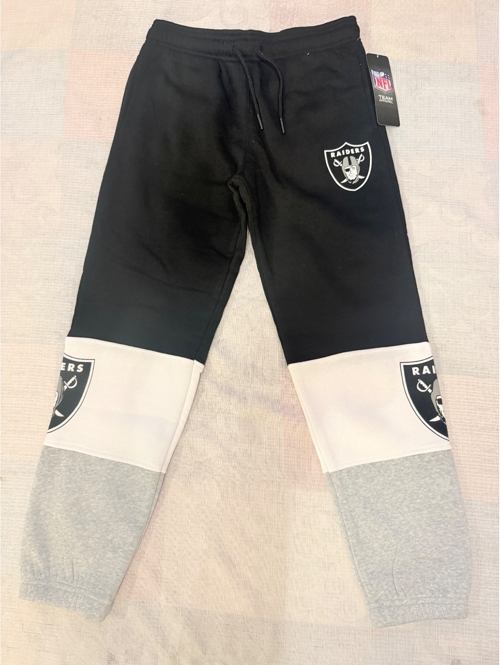 NFL Team Apparel Las Vegas Raiders black leggings kids medium